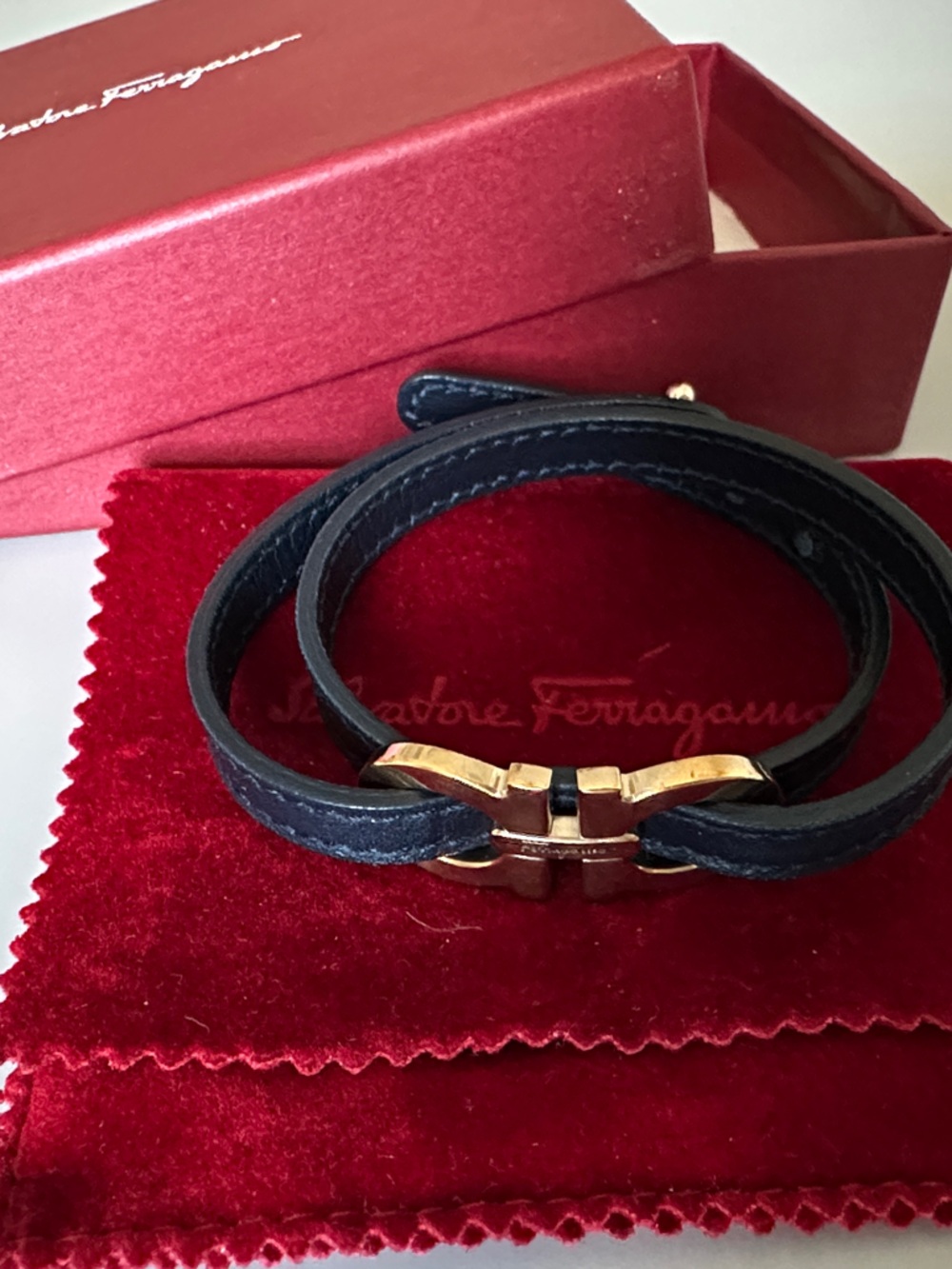 Salvatore Ferragamo Navy Leather Wrap Bracelet with Gold Bow Clasp